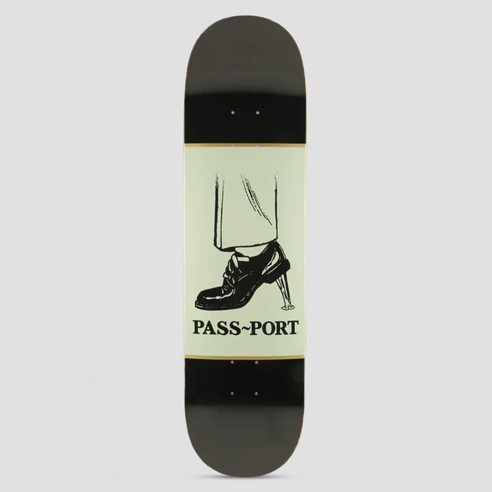 Passport Shoe Series Gumshoe skateboard deck: A black line drawing of a trouser leg and a lace-up shoe with a heel stuck in gum or a drain grate, on a pale green panel with 'Pass~Port' beneath, set on a black deck.