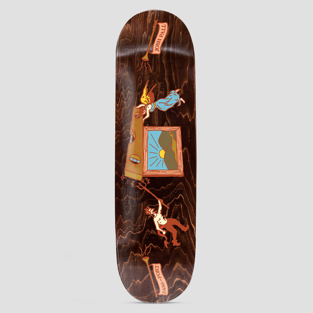 Passport Angel vs Devil Pro Series Josh skateboard deck: Sideways scene on a dark brown stained deck: an angel emerging from a doorway and a devil with a pitchfork on either side of a framed sunrise landscape, with trumpet banners carrying the rider and brand names.