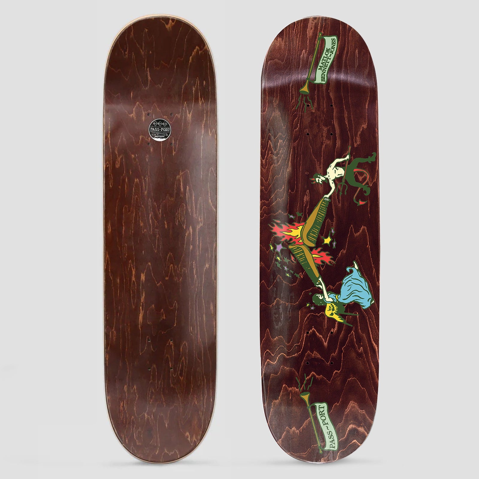 Passport Angel vs Devil Pro Series Matlock skateboard deck: Dark brown stained deck with a small illustration of an angel in blue and a green devil pulling opposite ends of a flaming keyboard, with green banner scrolls carrying the rider and Pass~Port names.