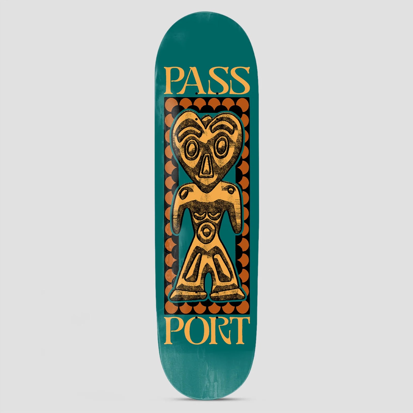 Passport Dogu Series Heart Head skateboard deck: A heart-headed clay figure in the style of an ancient Japanese dogu statue, in gold with black texture, framed by a scalloped orange border on a teal deck, with the word Passport split across the top and bottom.