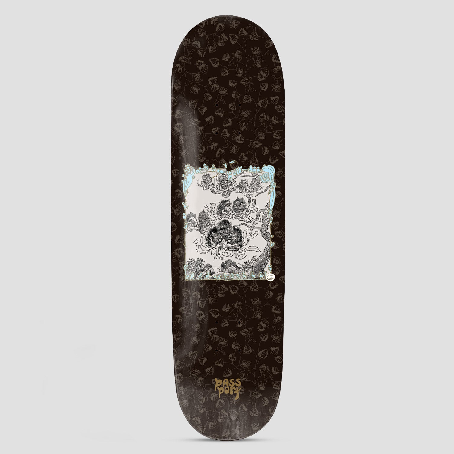 Passport x May Gibbs 8.25 Banksia Men skateboard deck: Dark brown deck with a pattern of small banksia pods and stems, and a central framed pen illustration of grinning banksia cone characters in a tree, with a pale blue border. Gold Passport logo at the tail.