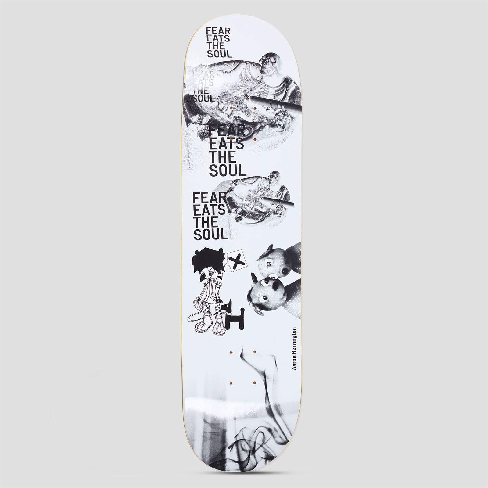 Polar Aaron Herrington Fear Eats The Soul skateboard deck: A black and white collage with the phrase FEAR EATS THE SOUL repeated three times, over statue photos, a cartoon figure with an X sign, two toy animal heads and smoke. Rider name along the right edge.