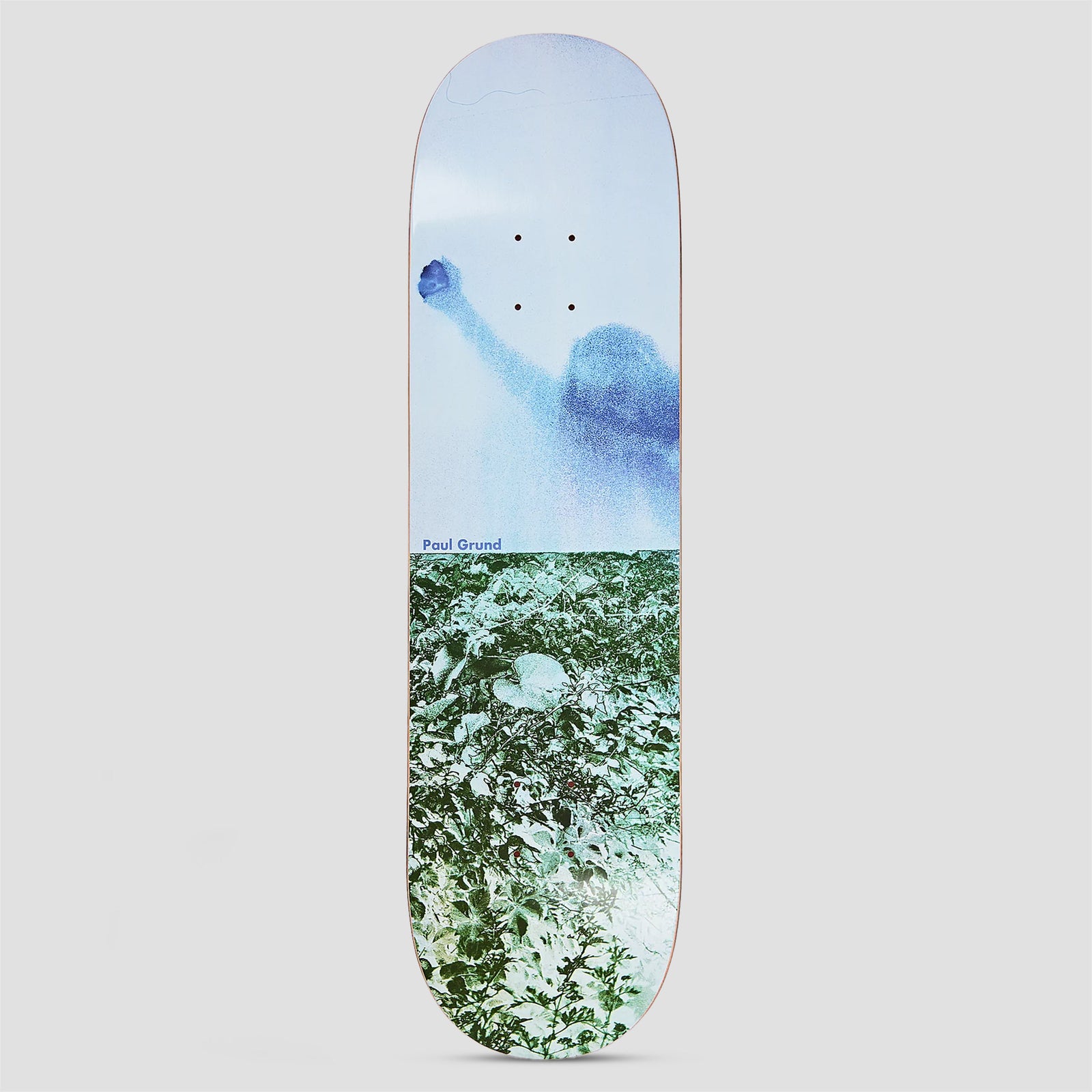 Polar Paul Grund Man With Window skateboard deck: A two-part photo, with a pale blue, grainy figure raising a fist in a window above and a green leafy field of plants below. A small blue rider name sits at the join.