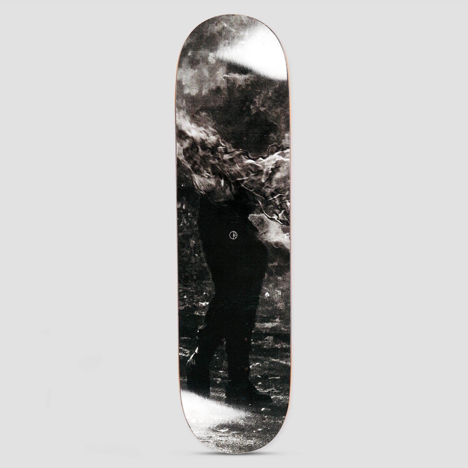 Polar Paul Grund Stuntman B skateboard deck: Grainy black and white photograph of a person in dark clothes and boots walking, their head and upper body hidden by billowing smoke. A small Polar logo sits at the centre.