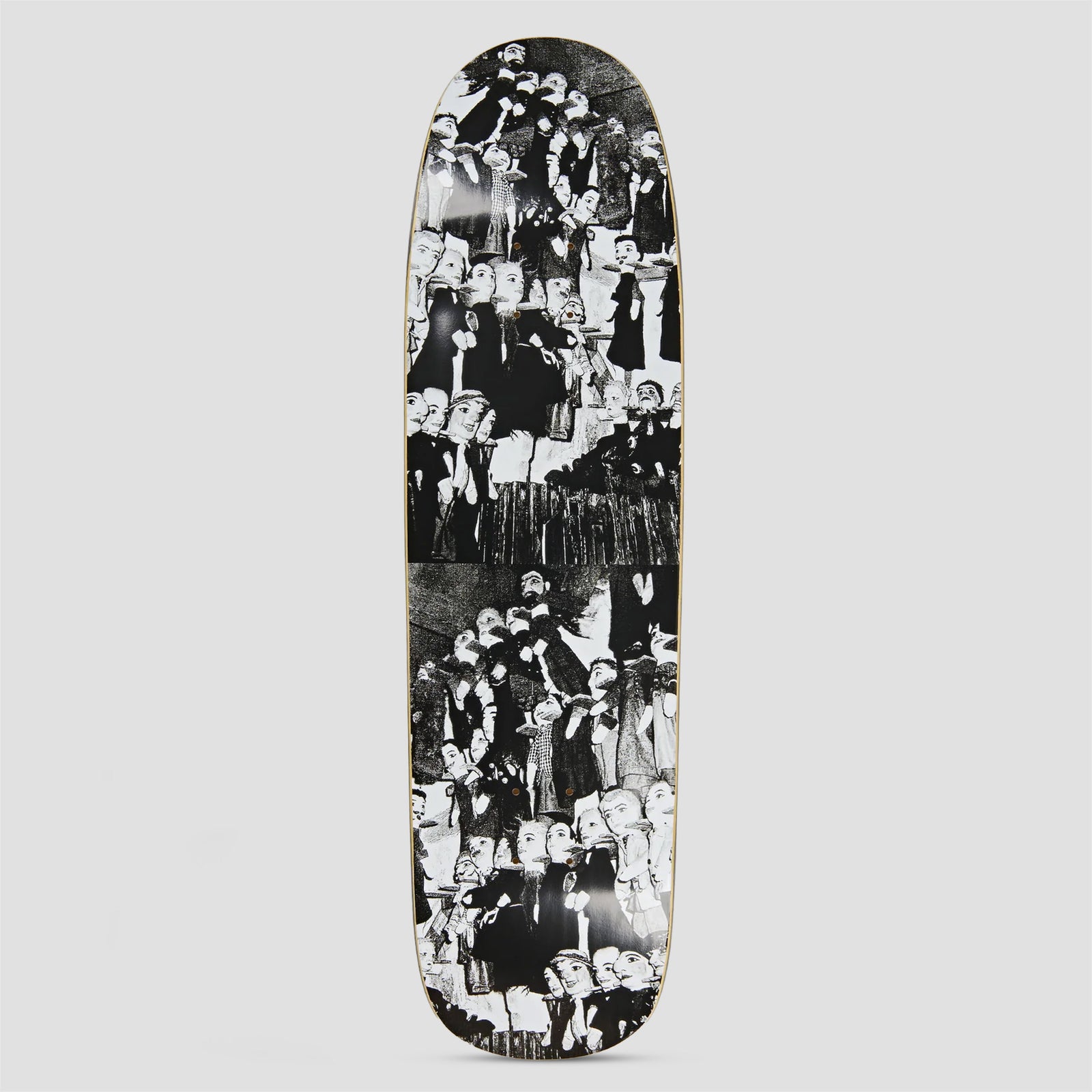 Polar P9 Shape Roman Gonzalez Puppet Storage skateboard deck: Black and white photo collage of rows of ventriloquist-style puppets with painted faces and dark clothes, repeated in two stacked panels across a shaped deck.