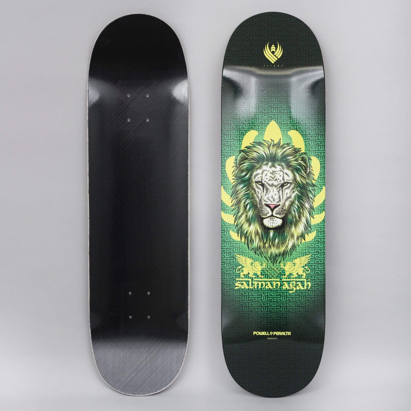 Powell Peralta Peralta 8.75 Salman Agah Lion 2 Shape 245 Flight skateboard deck: A detailed lion's head with a green mane in front of a yellow lotus-like shape and a green maze pattern, with two small winged griffins and the rider name beneath. The underside is plain black.