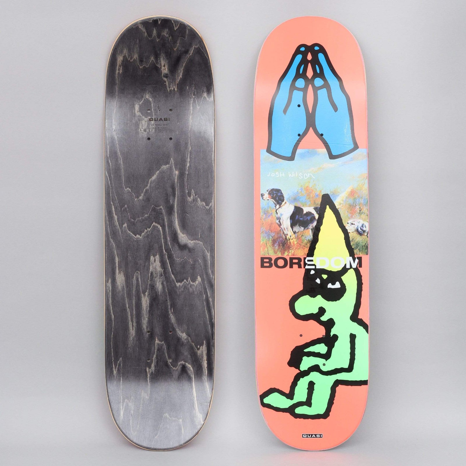 Quasi Quasi 8.25 Wilson Bored skateboard deck: Peach deck with blue praying hands at the top, a small painting of a pointer dog in a field, and a green cartoon figure slumped in a yellow pointed hat beneath the word Boredom. Black stained underside shown alongside.