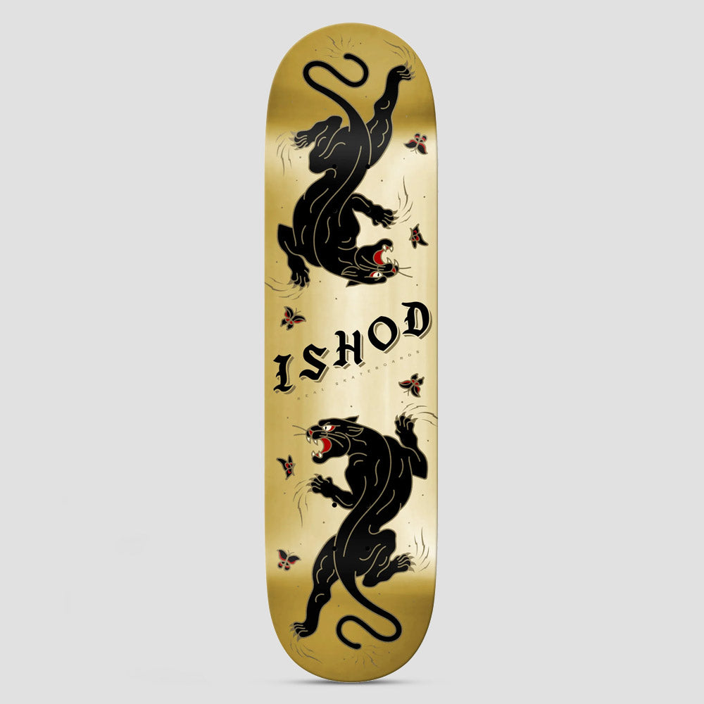 Real Cat Scratch Ishod TT DBX Gold skateboard deck: Two black panthers in traditional tattoo style, one upside down, face each other on a metallic gold deck, with small red-and-black butterflies. Ishod is lettered in black gothic type in the centre.