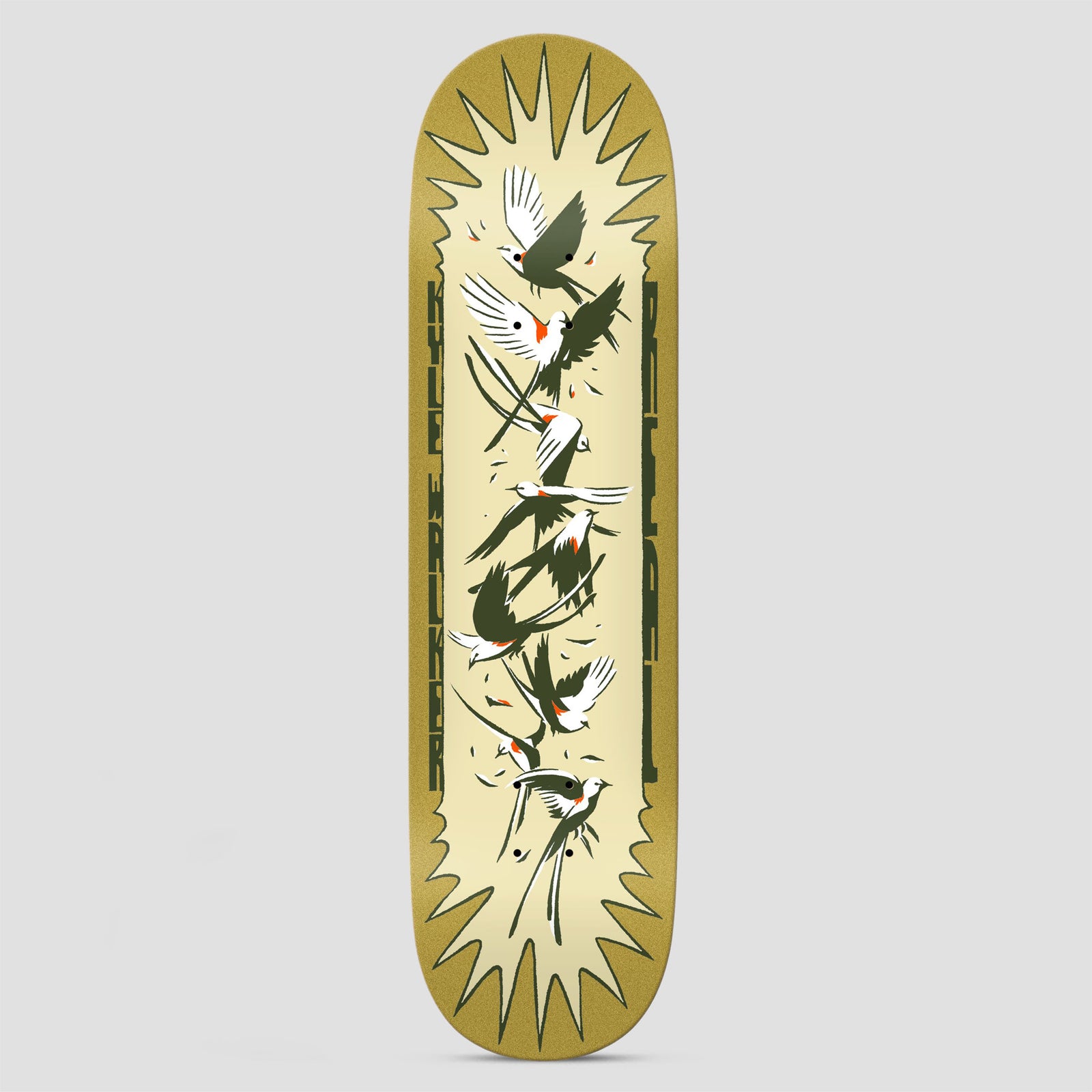 Real Kyle Flock Easy Rider skateboard deck: Flock of white and olive-green birds with long tails and orange flecks, flying in a vertical stack that forms lettering inside a pale cream sunburst on a mustard deck. Vertical text runs down both sides.