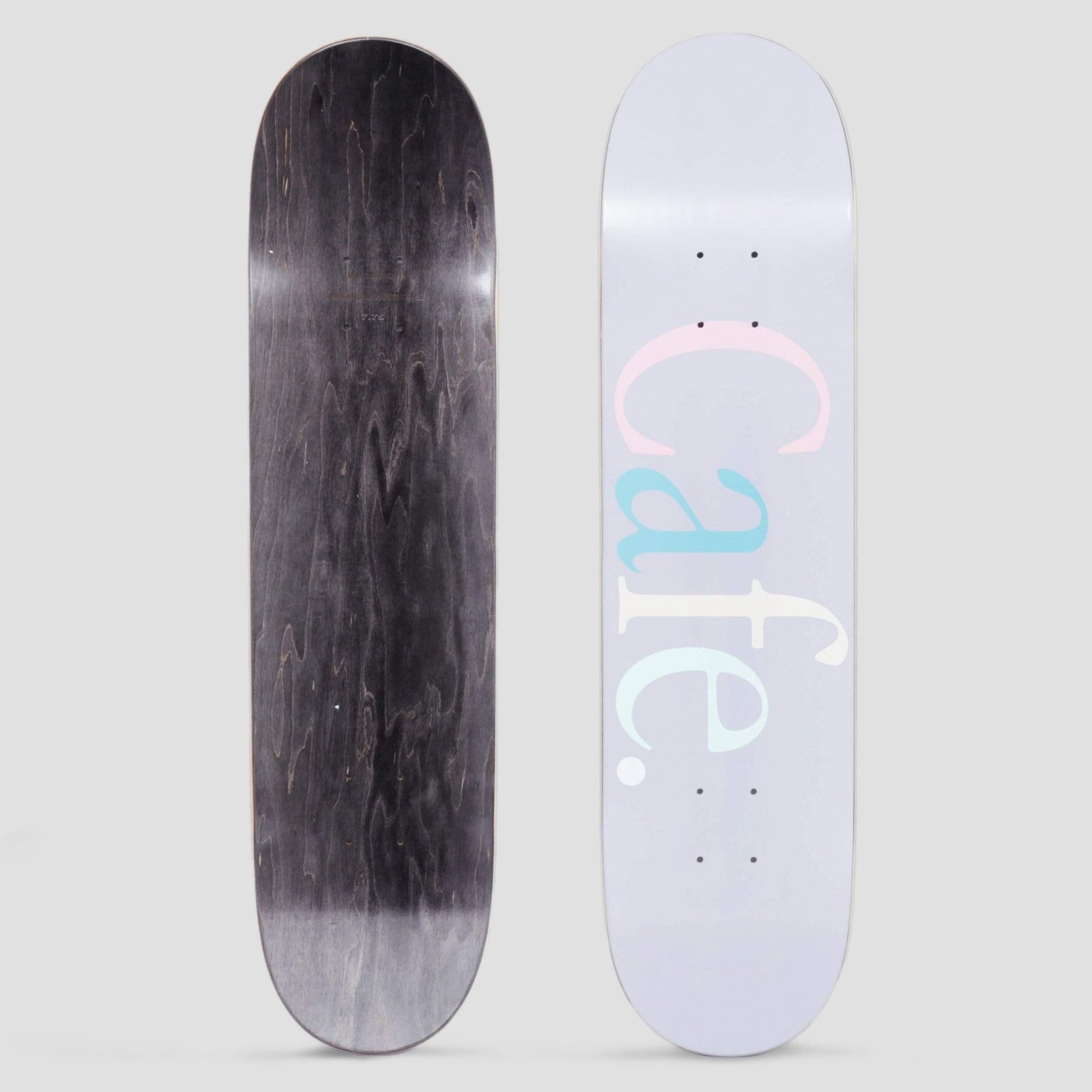 Skateboard Cafe Wayne Powder Blue skateboard deck: Pale powder-blue deck with a large lower-case serif Cafe wordmark stacked vertically, each letter in a different pastel shade of pink, teal and pale mint, followed by a full stop.