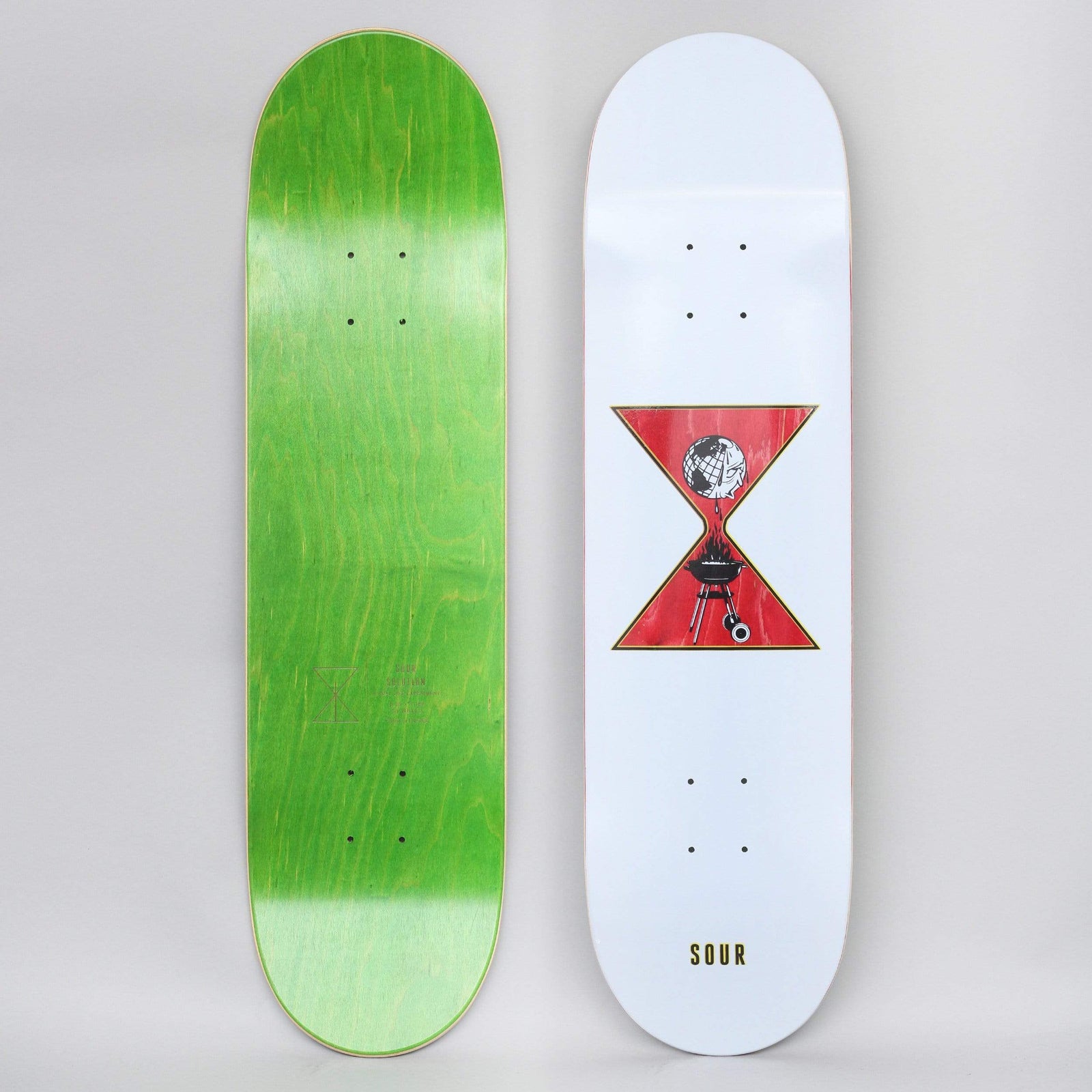 Sour Global BBQ Pale Blue skateboard deck: Red hourglass shape containing a globe at the top and a barbecue grill at the bottom, with smoke between them, set on a pale deck. Sour wordmark near the tail; underside is green.