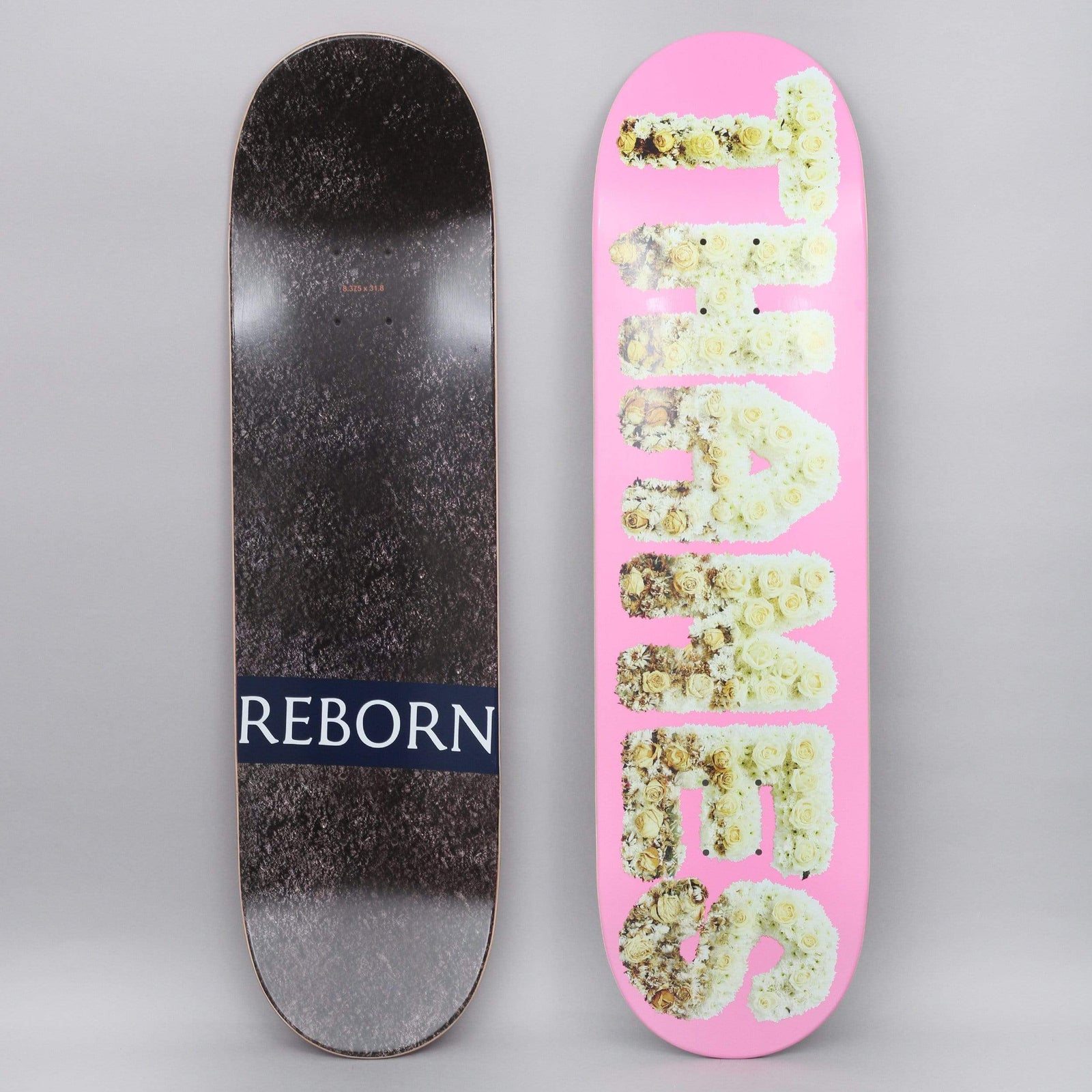 Thames MMXX Thames 8.375 Reborn Hubba Bubba Pink skateboard deck: Large vertical block letters spelling THAMES, filled with a photograph of white and cream roses, on a flat pink ground. The bottom side has a navy REBORN banner across a black speckled surface.