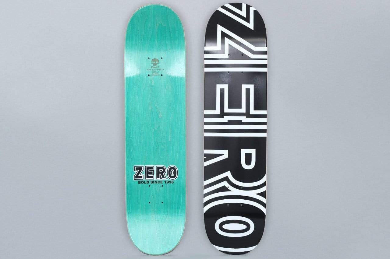 Zero Zero 7.75 Bold Black / White skateboard deck: Large white outlined 'Zero' block lettering running vertically down a black deck. The teal-stained underside shows a small 'Zero Bold since 1996' logo.
