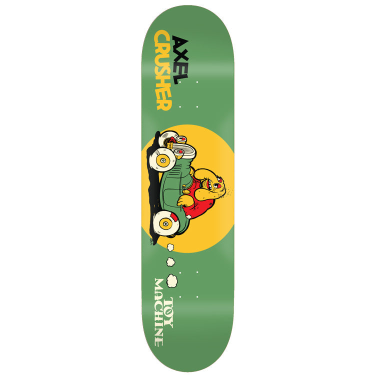 Toy Machine Axel Cruysberghs Toons 8.25 skateboard deck: A cartoon yellow figure in a red top driving a green car with large white eyeball wheels, in front of a yellow circle on a green deck, with Axel Crusher lettering at the top and Toy Machine at the bottom.