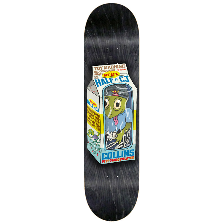 Toy Machine Cj Collins Toy Dolls 8.38 skateboard deck: Milk carton parody with a green zombie-like creature and skeleton hands sealed in a window, with joke packaging text on the sides. Carton sits on a black stained deck.