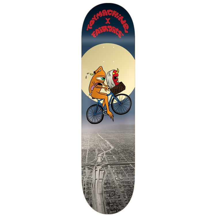Toy Machine Fairdale Bikes 8.50 skateboard deck: Orange one-eyed Toy Machine monster rides a bicycle across a huge pale moon, carrying a red devil in the basket, above a black-and-white aerial photo of a city and freeways. Parody of a famous flying-bike film scene.