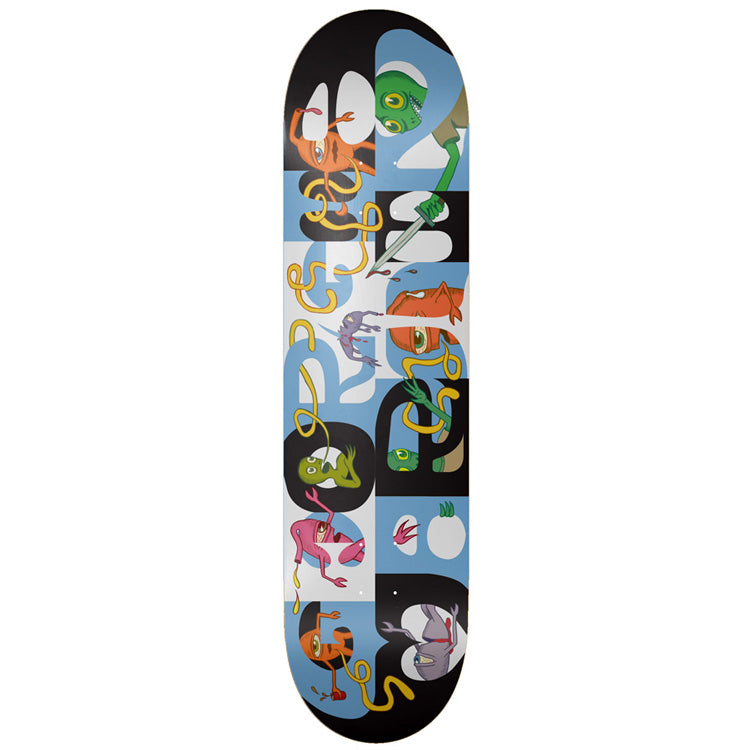 Toy Machine Georgia Georgia Martin 8.38 skateboard deck: Cartoon creatures in orange, green, pink and purple tangle with yellow worm-like noodles, interleaved with giant black and white letters on a pale blue background. One green creature holds a knife.