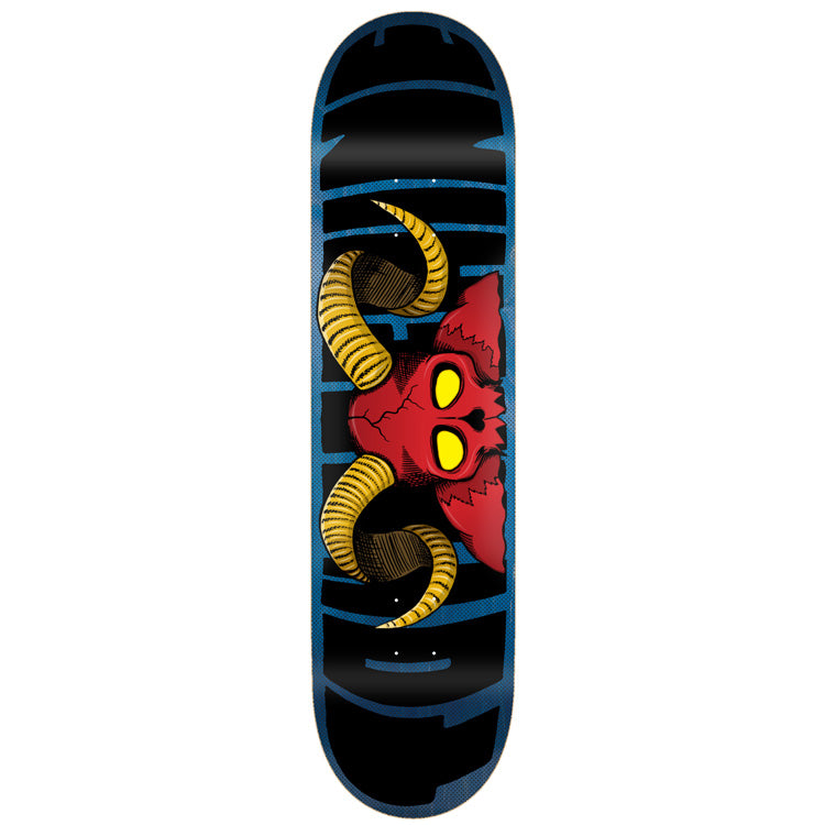 Toy Machine Horns Red 8.50 skateboard deck: Red cracked demon skull with yellow eyes and large curled yellow horns, half peeking over the middle of a black deck, with giant blue outlined lettering behind it.