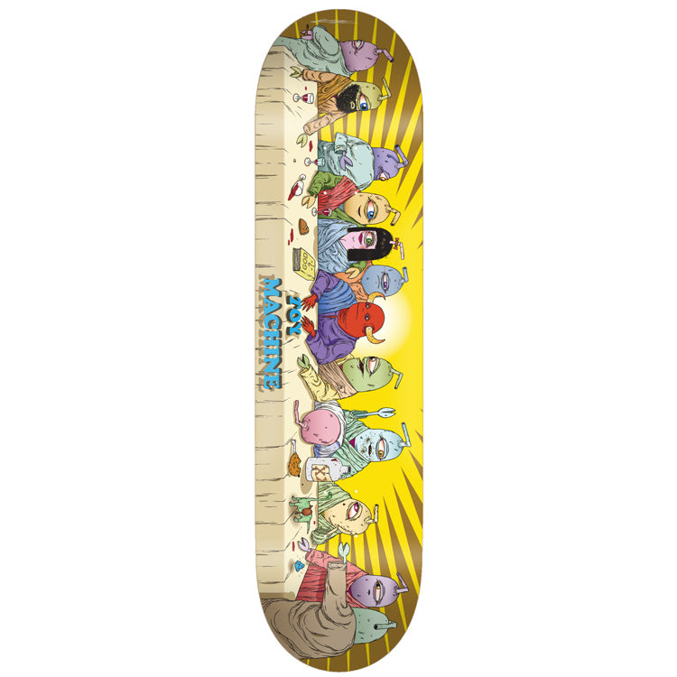 Toy Machine Last Supper 8.38 skateboard deck: A cartoon parody of the Last Supper, with colourful one-eyed Toy Machine monsters seated along a long table of food and drink, set against a yellow burst. The brand name runs along the table edge in blue.