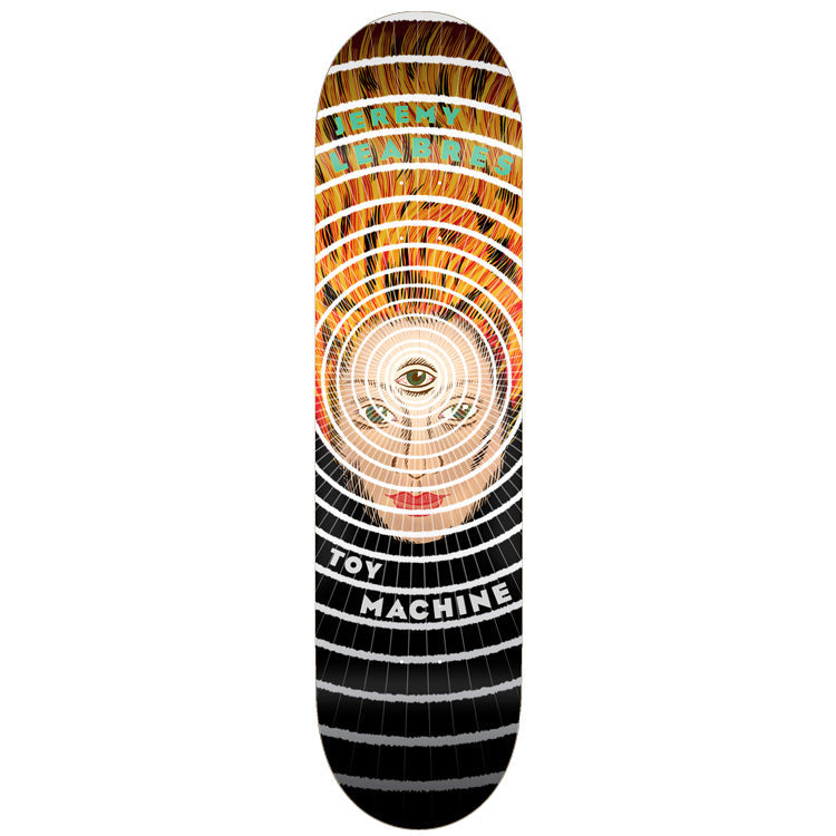 Toy Machine Jeremy Leabres Third Eye 8.25 skateboard deck: Concentric rings radiate from a woman's face with a third eye on her forehead, with flame-like orange hair at the top and black and grey rings below. Rider name in green at the top.