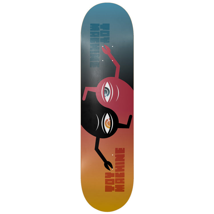 Toy Machine Ying Yang Sym 8.25 skateboard deck: Two one-eyed, armed creatures, one pink-red and one black, curled together in a yin-yang arrangement on a blue-to-orange gradient, with Toy Machine lettering at each end.