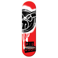Pig Spray Red skateboard deck: Black spray-stencil Pig head logo with sunglasses-style eyes and a toothy grin, with white spray overspray and drips, on a red deck. PIG WOOD is in red typewriter letters on black strips at the tail.
