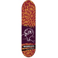 Toy Machine Stephens Turtle skateboard deck: Maroon deck covered in yellow-orange dashes, with a dark purple panel in the middle holding a white line drawing of a bird-like turtle head with a large eye. Brand and rider name sit in a black strip near the tail.