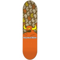 Toy Machine Paisley skateboard deck: Orange horned Toy Machine monster rising from a solid orange lower half, with a brown upper half patterned with paisley shapes in cream, orange and mustard. Toy Machine logo sits across the middle.