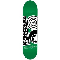 Foundation Nguyen Questionable skateboard deck: Green deck with the large black and white Foundation logo, a tilted wordmark box beside concentric-circle F and star emblems, and a script signature near the bottom.