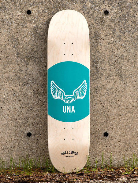 Unabomber Spot - Seafoam skateboard deck: Natural maple deck with a large seafoam green circle holding a white winged handshake emblem above the letters UNA. Unabomber Skateboards logo near the tail.