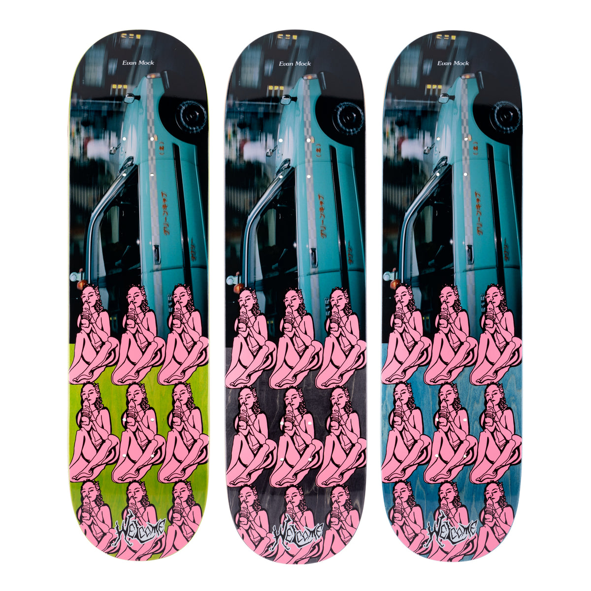 Welcome Evan Mock Taxi on Island - Various Stains - 8.38 skateboard deck: Photo of a teal Japanese taxi at the top of the board over a grid of pink seated figures drinking from bottles, with Welcome script at the tail. Shown in three stain variants: green, black and blue.