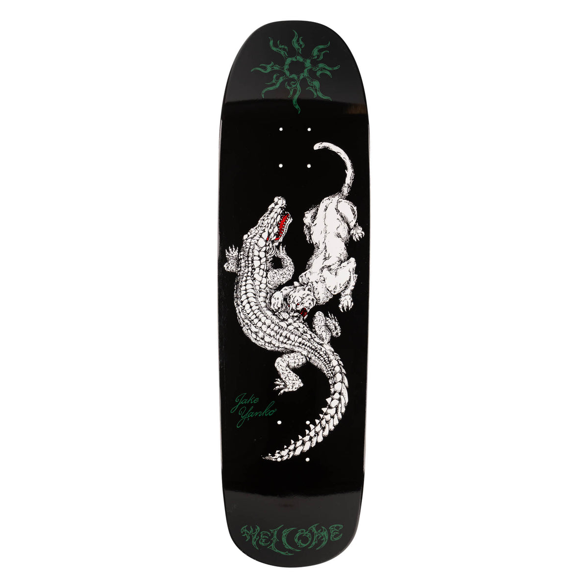 Welcome Jake Yanko Swamp Fight on Panther - White/Black - 9.0 skateboard deck: A white-line illustrated crocodile and a panther locked in a fight, with a red mouth on the croc, on a black shaped deck. A green tribal sun motif sits at the nose and green lettering at the tail.