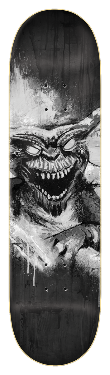 Zero Burman - Gremlin 8.25 skateboard deck: Black and white painted, splattered image of a snarling gremlin-like creature with large ears, glaring eyes and jagged teeth, with white streaks and black drips around it.