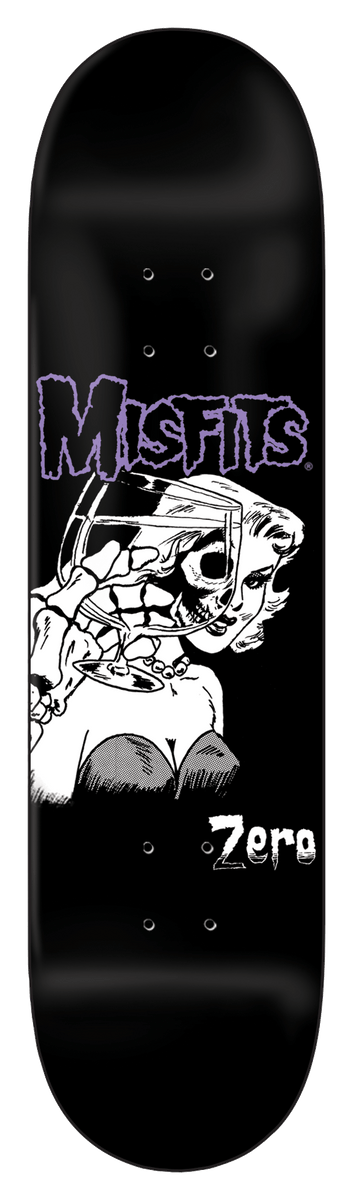 Zero Die Die skateboard deck: Black deck with a purple MISFITS logo above a black and white illustration of a skeletal-faced woman holding a cocktail glass. Zero is printed at the lower right.