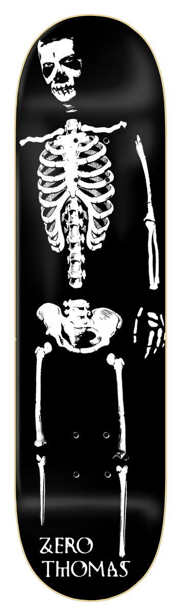 Zero Dying To Live Skeleton skateboard deck: A full white skeleton laid out down the length of a black deck, with a skull face, ribcage, pelvis and leg bones, as in an X-ray style print. Zero and rider name in white serif capitals at the tail.