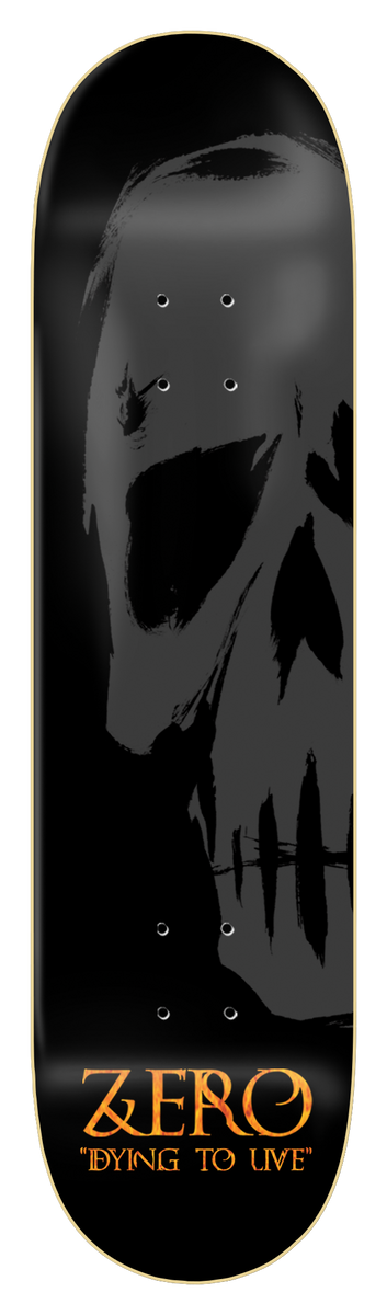 Zero Dying To Live Skull 8.5 skateboard deck: Large grey brushed skull, cropped at the edge, on a black deck, with the Zero name and a Dying to Live slogan in orange gothic lettering at the bottom.