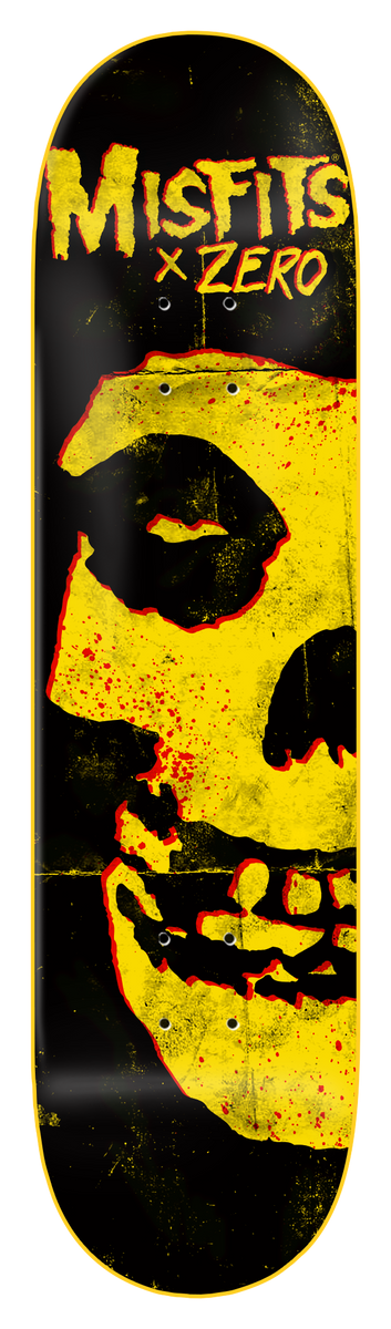 Zero Fiend Skull - Yellow Dipped skateboard deck: Black deck with Misfits x Zero lettering in yellow at the top above a large cropped yellow Fiend skull with red blood splatters, with a yellow edge dip.