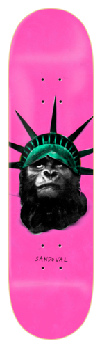 Zero Iconoclash - Sandoval skateboard deck: A black and white gorilla head wearing the green spiked crown of the Statue of Liberty, on a hot pink deck, with the rider name in handwritten text below.