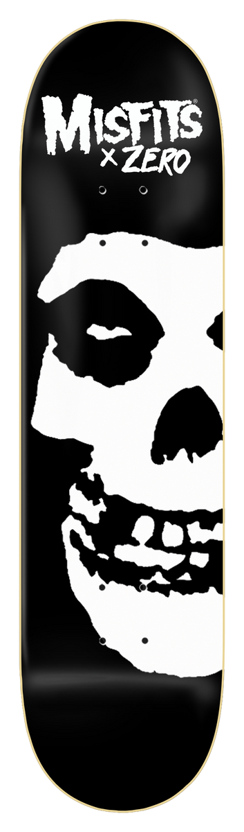Zero Misfits Fiend Skull - Hand - Screened - Black/White skateboard deck: Black deck with a huge white Misfits Fiend Skull face filling the lower half, cropped at the right edge, under a white Misfits x Zero logo at the top.