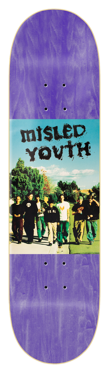 Zero Misled Youth 8.25 - Purple skateboard deck: Colour photo panel across the middle of a purple-stained deck showing a group of young men in dark clothes walking along a path past trees under a blue sky, with Misled Youth in a scratchy black hand-drawn font above them.