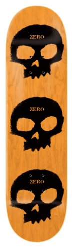 Zero Multi Skull Stencil - 8.25 & 8.5 skateboard deck: Three large black stencil-style skulls stacked down the length of an orange wood-stained deck, each with a small orange Zero wordmark across the forehead.