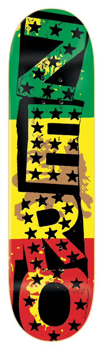 Zero Sandoval - Rasta Punk 8.25 skateboard deck: Large black Zero lettering with stencil-like blocks and black stars, over horizontal green, yellow and red stripes with a faded lion shape, on a black deck.