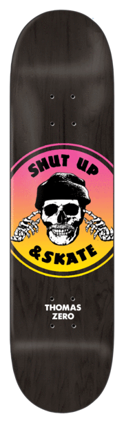 Zero 2 Tone Shut Up & Skate - Thomas skateboard deck: A round badge with a pink to yellow gradient shows a skull in a beanie with skeletal hands over its ears, circled by the words Shut Up and Skate, on a black stained deck. Rider surname and brand are printed below.