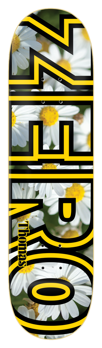 Zero Thomas - Floral Bold skateboard deck: Large ZERO block letters in black and yellow outline filled with a photograph of white daisies, on a black deck, with Thomas written along the lower letters.