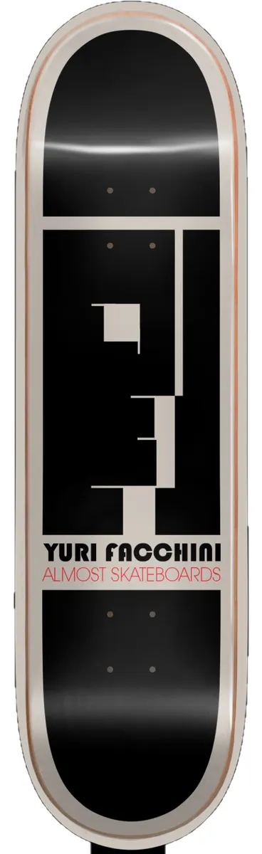 Almost Yuri Bauhaus Impact Pro Light 8.375 skateboard deck: Black deck with a cream-coloured border and a blocky geometric profile head in black and cream, in the style of a Bauhaus poster. Rider name and brand printed beneath in cream and red.