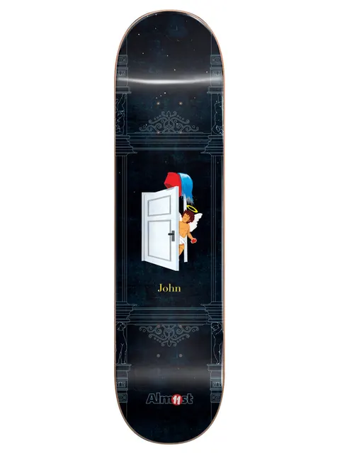 Almost Dilo Gronze Collab R7 8.5 skateboard deck: Classical architectural frame with ornate scrollwork on dark navy, with a white door ajar. A red and blue bucket tipping paint is balanced on the door and a winged cherub peeks round it. John in yellow text, Almost logo at the foot.