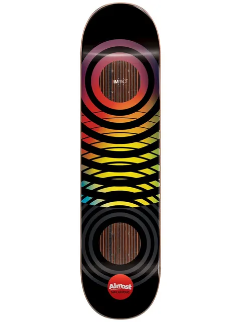 Almost Max Black Blur Impact 8.0 skateboard deck: A black deck with a stack of concentric rings that shift from red and purple at the top through orange and yellow to blue, then dark grey at the bottom, with two wood-grain circles and a red Almost dot logo at the tail.