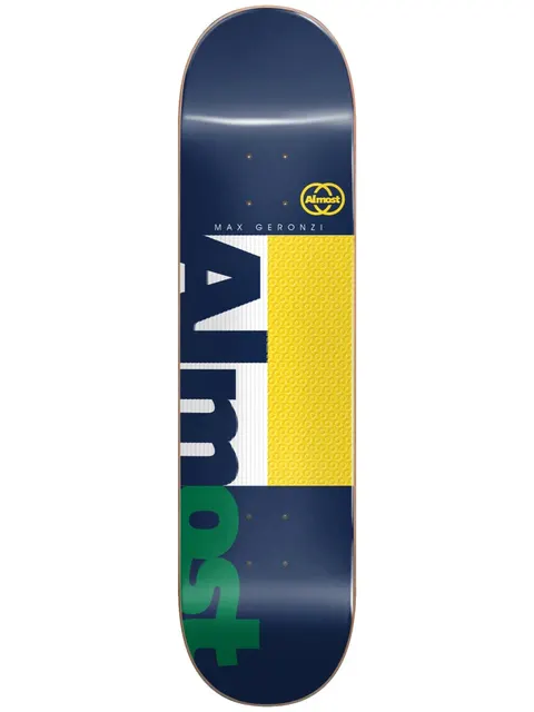 Almost Max Ivy League Impact Light 8.25 skateboard deck: Navy deck with an oversized, split 'Almost' wordmark in navy, white and green, beside a yellow block with a dotted texture. Small 'Max Geronzi' text and a yellow circular Almost logo at the top.