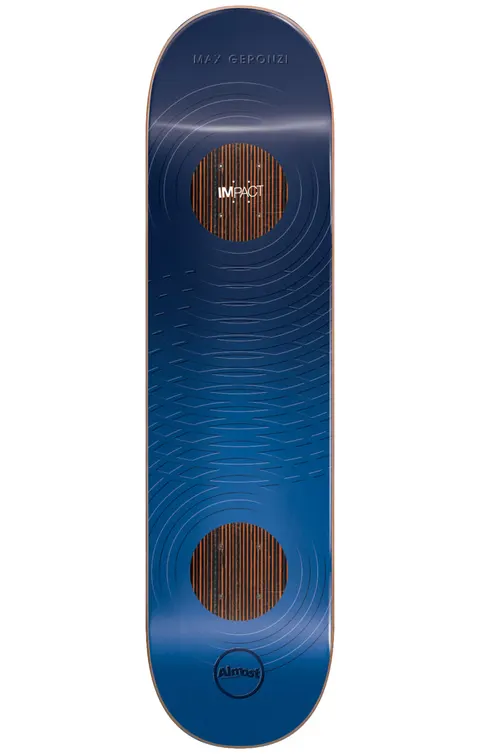 Almost Max Raised Rings Impact 8.0 skateboard deck: A glossy navy blue deck with embossed concentric ripple rings, and two circular wood-grain panels showing the Impact support layer at the nose and tail. The Impact logo is in the upper circle and the Almost logo sits at the bottom.