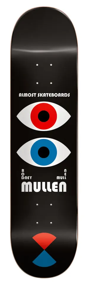Almost Mullen Bauhaus Impact Pro Light 8.0 skateboard deck: Black deck with two large stylised eyes, one red and one blue, stacked above the white MULLEN name, with a red and blue hourglass shape at the tail. Bauhaus-style graphic design.